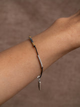 The meaningful and spiritual "Envie" braided bracelet handmade by Leeloobird Jewelry in Bali
