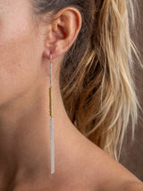 Sunny earrings by Leeloobird Jewelry brand in Bali featuring gold vermeil accents shaped like sun rays, attached to sterling silver 925 ear wires.