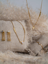 The meaningful and spiritual "Maybe" jewelry necklace handmade by Leeloobird Jewelry in Bali