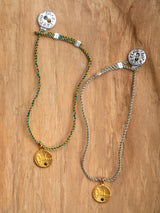 The meaningful and spiritual "OUI" braided bracelet handmade by Leeloobird Jewelry in Bali