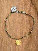 The meaningful and spiritual "Oui" braided bracelet handmade by Leeloobird Jewelry in Bali