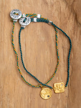 The meaningful and spiritual "Oui" braided bracelet handmade by Leeloobird Jewelry in Bali