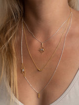 Close up of the meaningful and spiritual Gratefulness necklace handmade by Leeloobird Jewelry in Bali