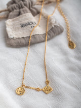 The meaningful and spiritual "Oui a la Vie" necklace handmade by Leeloobird Jewelry in Bali