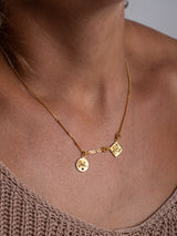 The meaningful and spiritual "Oui a la Vie" necklace handmade by Leeloobird Jewelry in Bali