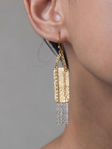 Presence earrings by LeeLoobird Jewelry brand in Bali featuring a geometric design with a shiny gold upper section and a textured silver lower section
